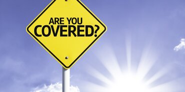 Are You Covered Road Sign